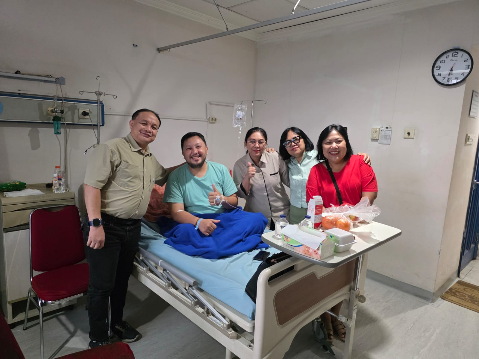 TRG colleagues visiting a team member during hospital care