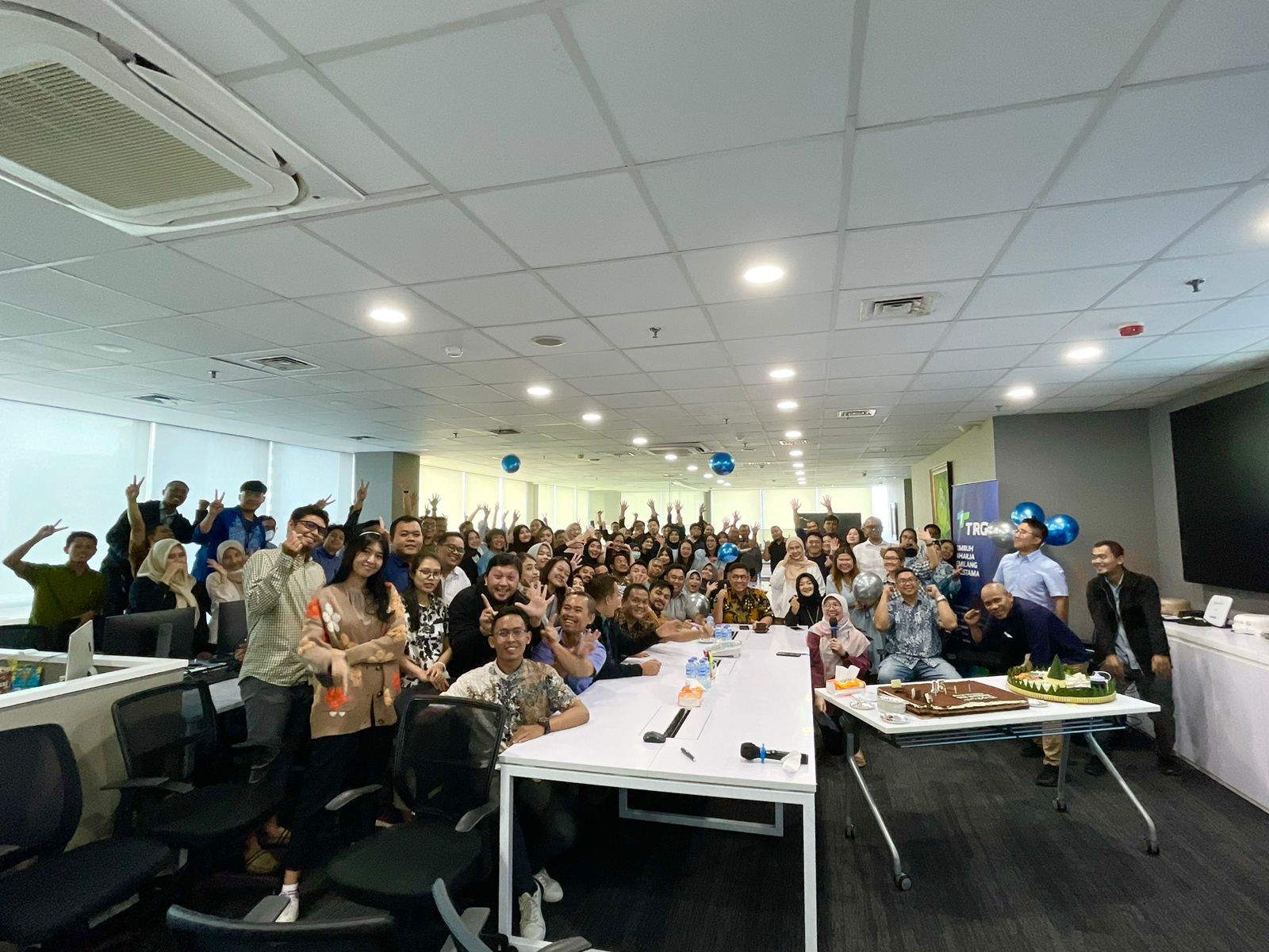 TRG Group 15th anniversary celebration in the office