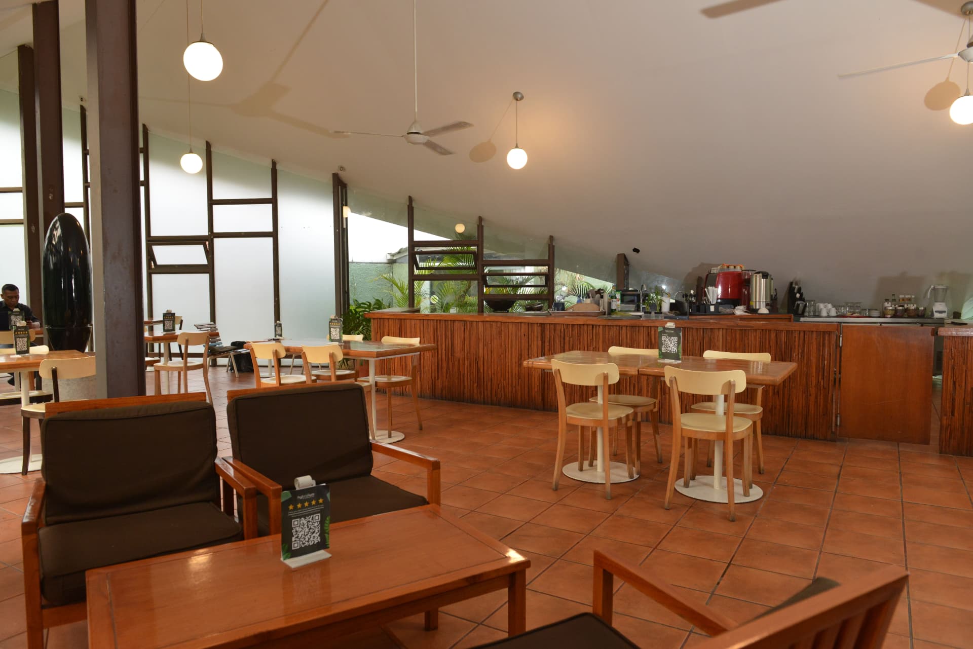 Resto Joglo dining area with bamboo bar and open seating